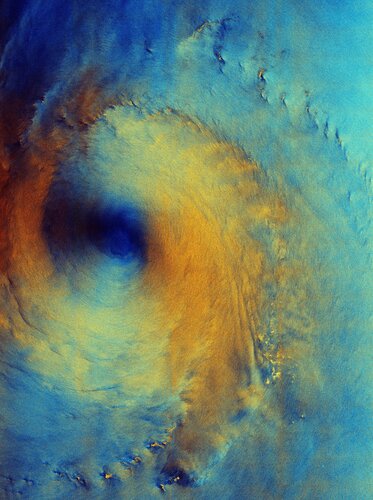 This false-colour, polarised image from Copernicus Sentinel-1 shows us the surface of the sea beneath the clouds, as seen by the satellite’s radar instrument. The sea conditions reflect the strong winds as Typhoon Surigae passes over.