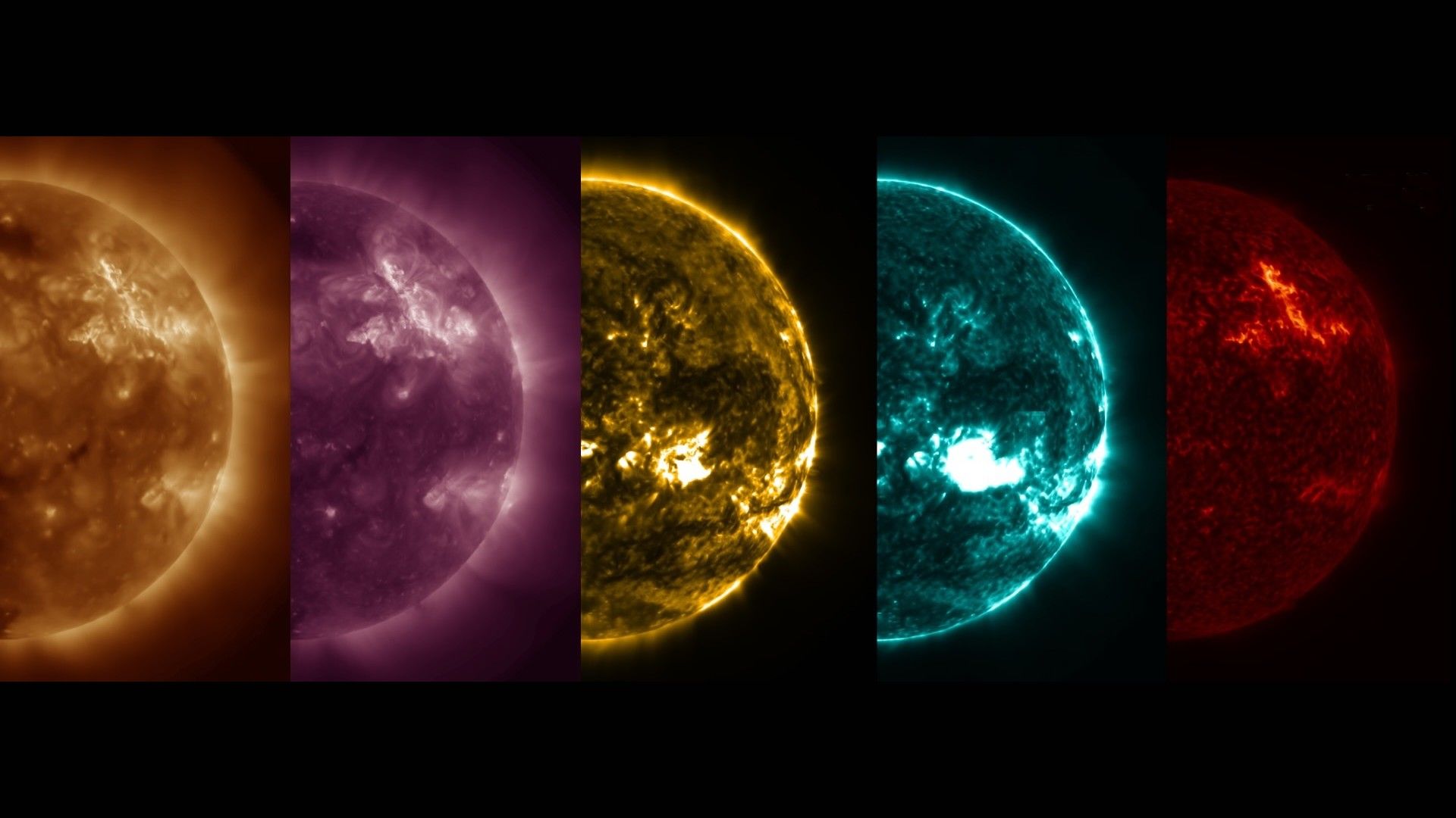 four half-orbs, each in a different color, on a black background