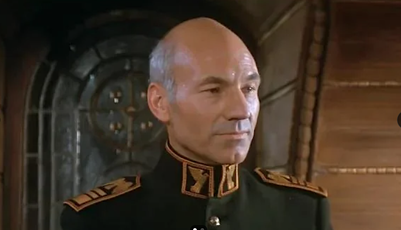 a noble man in a regal sci-fi uniform