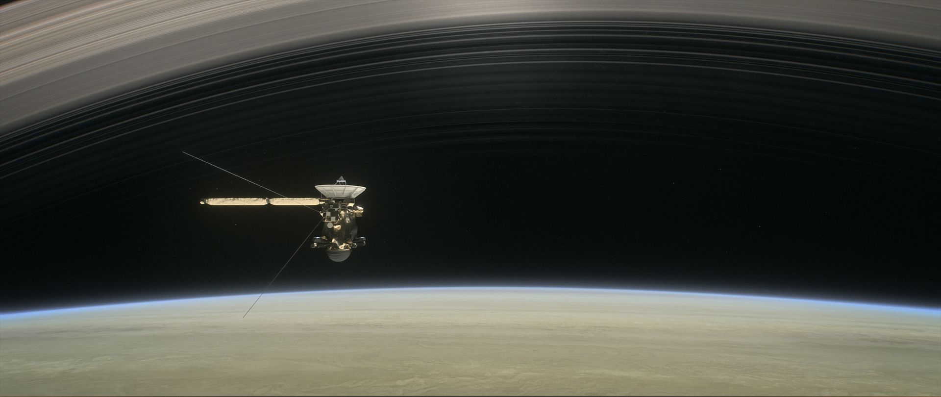 This artist's illustration shows Cassini making one of its final five dives through Saturn's upper atmosphere in August and September 2017.
